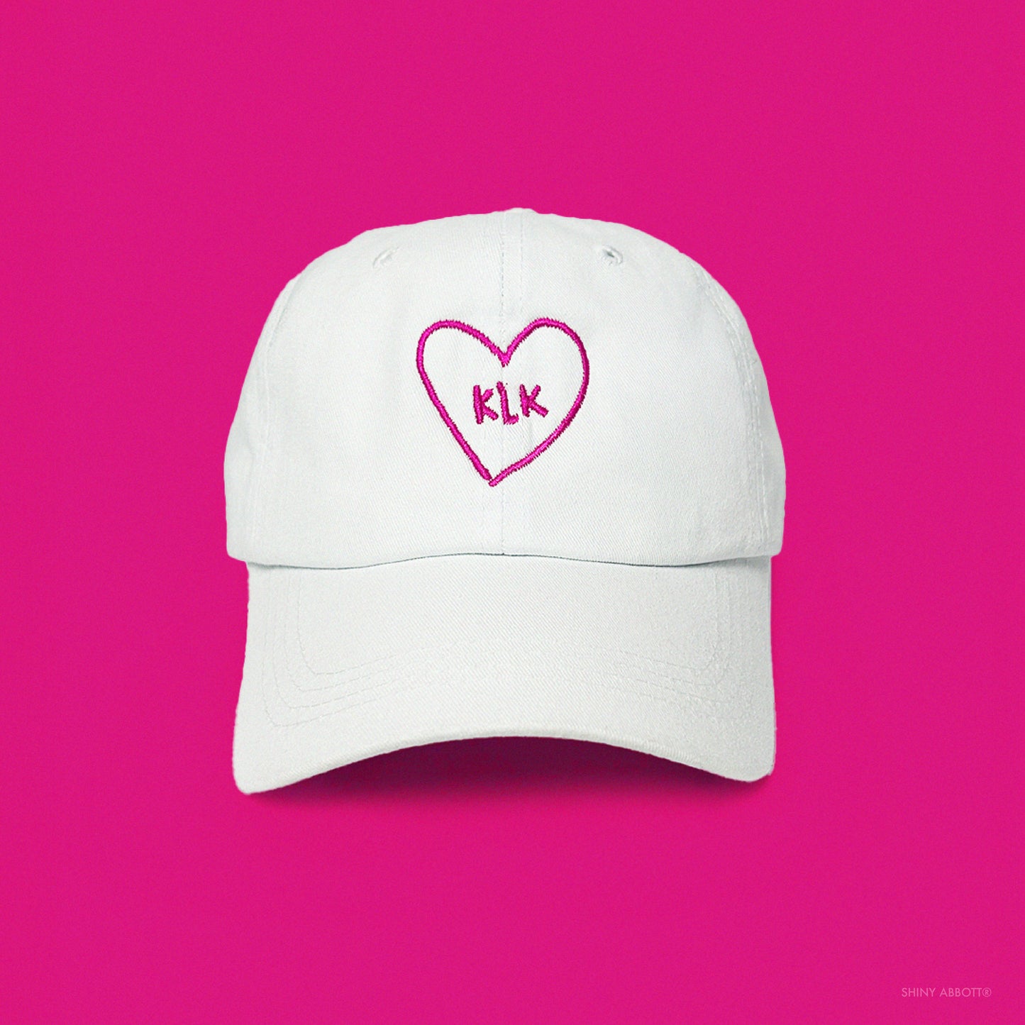 White Baseball Cap with Hot Pink KLK Heart Embroidery