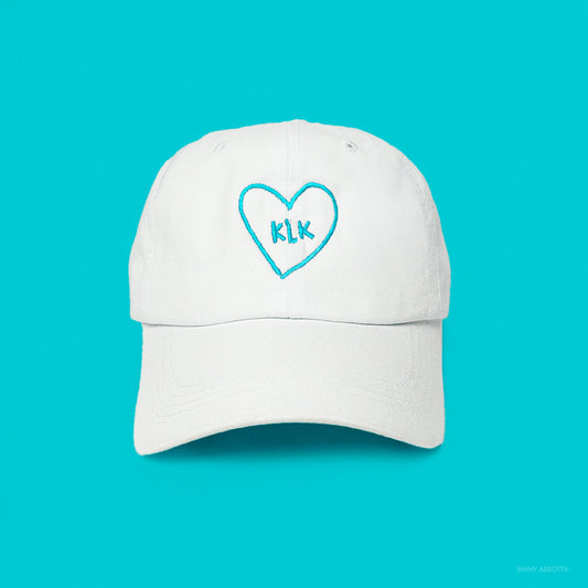White Baseball Cap with Aqua KLK Heart Embroidery